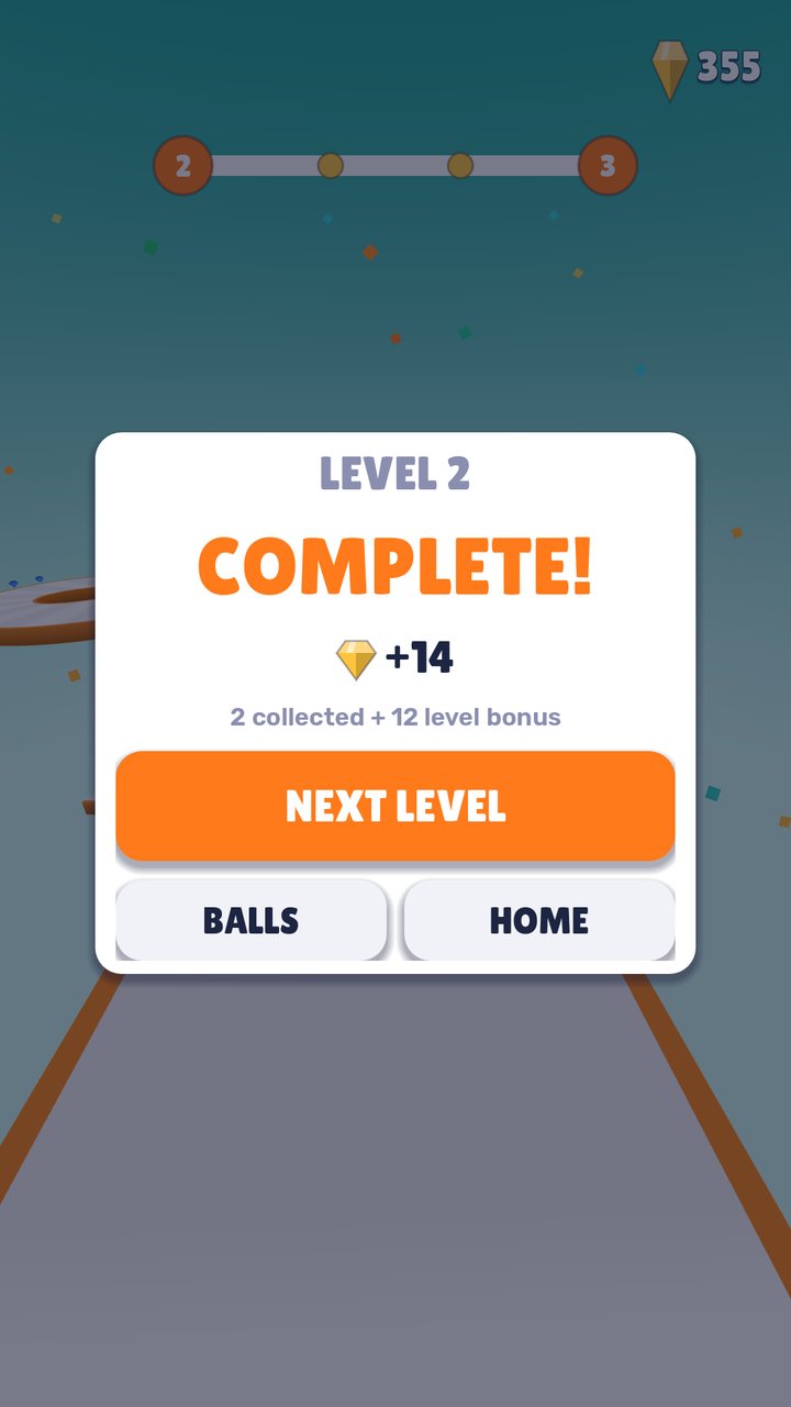 The level complete screen with the gems earned and a Next level button